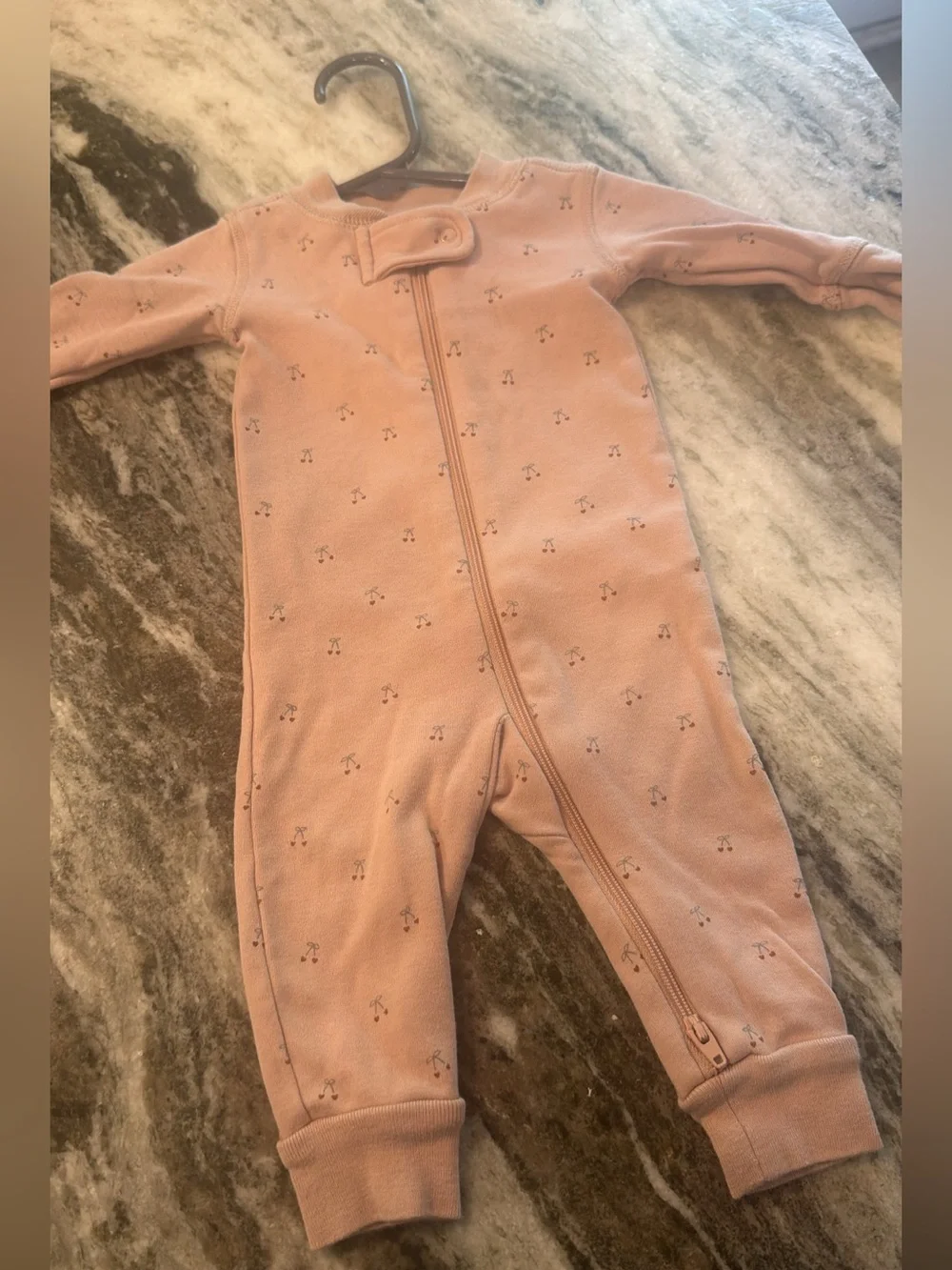 Baby Long-Sleeve Zip One-Piece in Light Pink with little cherries all over it